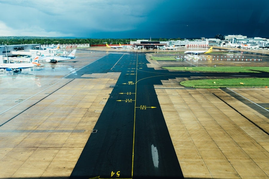 airport runway with planes
