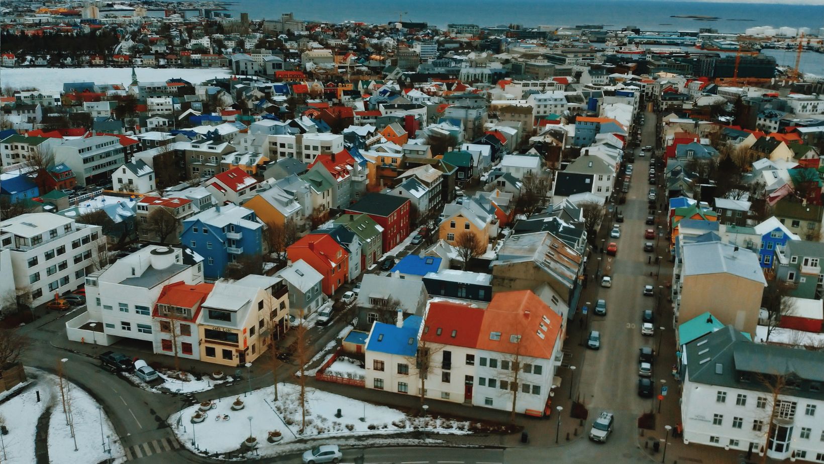 Scenery of streets and buildings of snowy Reykjavik